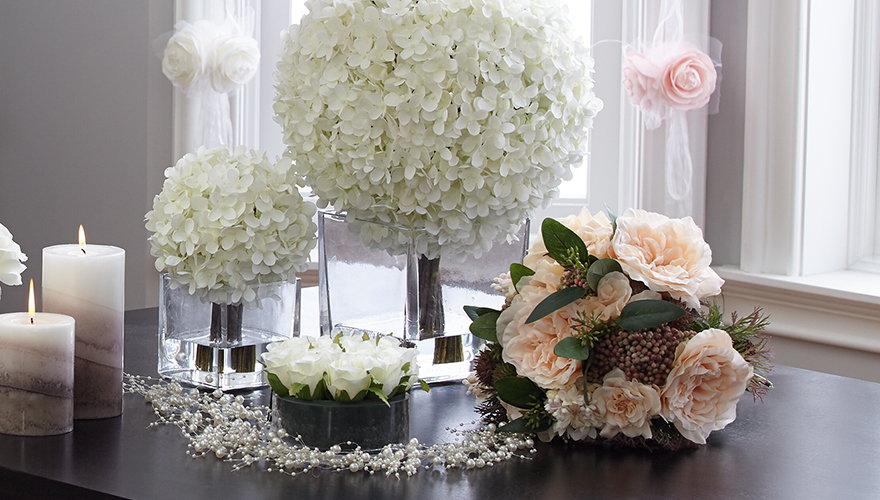 Floral centerpieces can be varying heights to add interest.